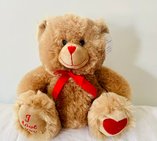 Soft brown plush teddy bear featuring a classic red bow, approx. 24cm tall