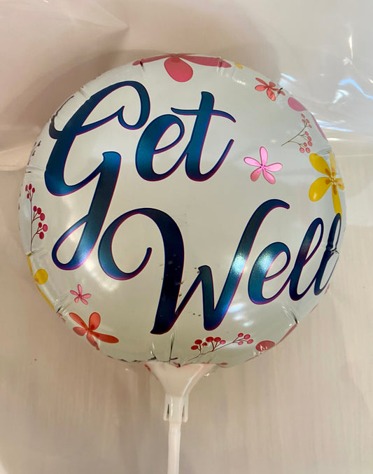 Round ‘Get Well’ foil balloon featuring a soft frangipani design, approx. 22cm in diameter.