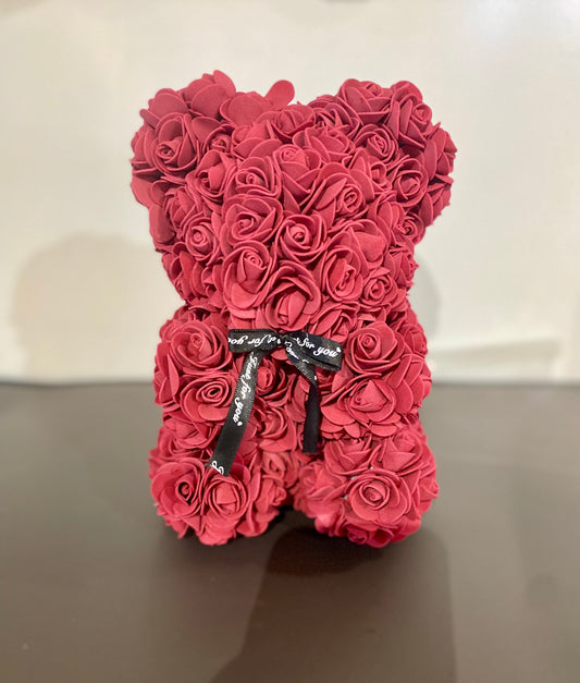 Burgundy artificial rose bear, 25cm tall, crafted from soft rose buds and presented as a long‑lasting keepsake gift